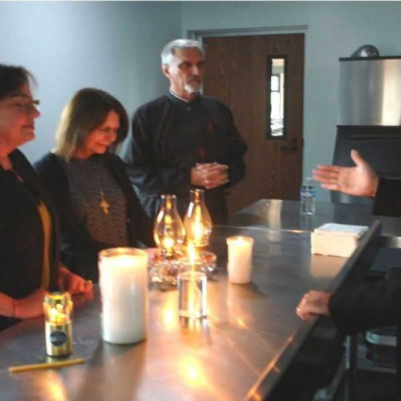 The Holy Fire awaits the entrance into the church for the Vespers