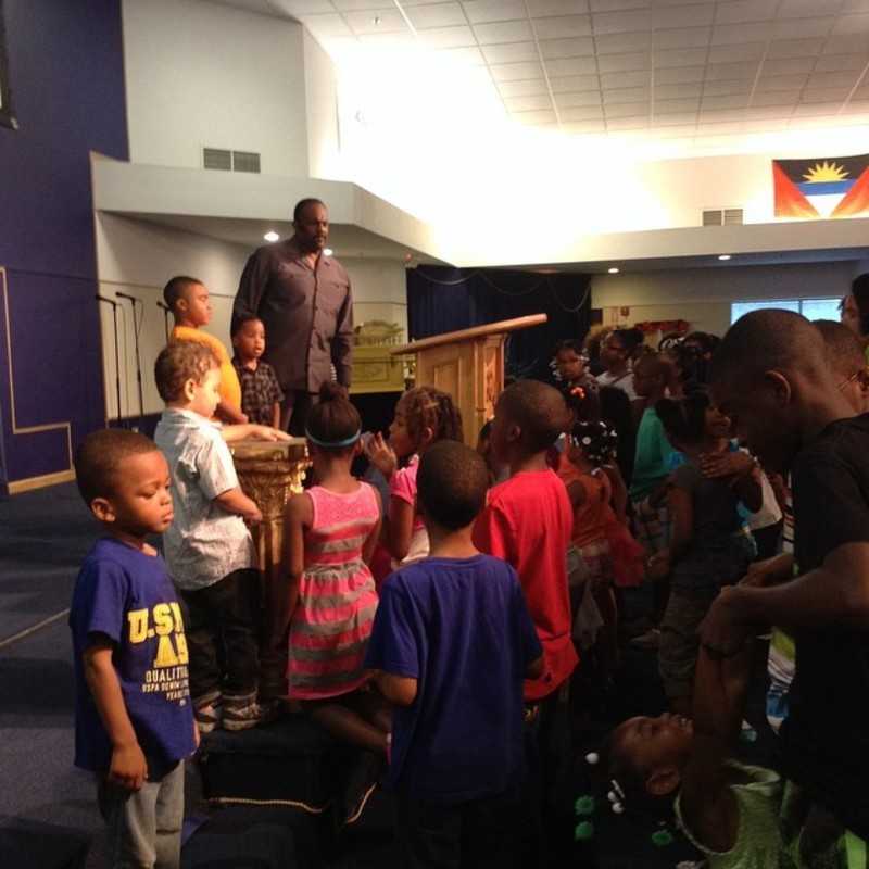 Apostle Ron praying a covering over our kids