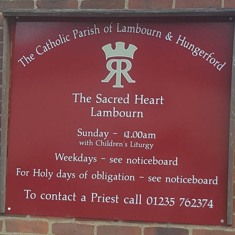 The Sacred Heart Church sign