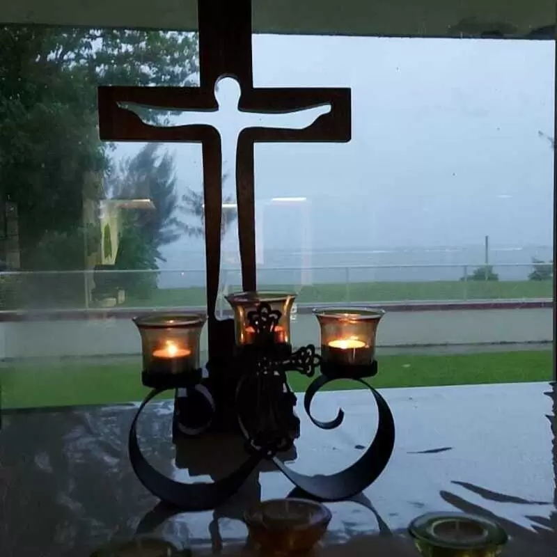 Early morning prayer time with the sound of the ocean and the rain