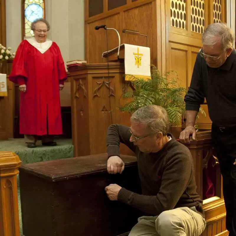 Emmanuel United Church of Christ opens antique box - photo courtesy of Dayan Jimenez