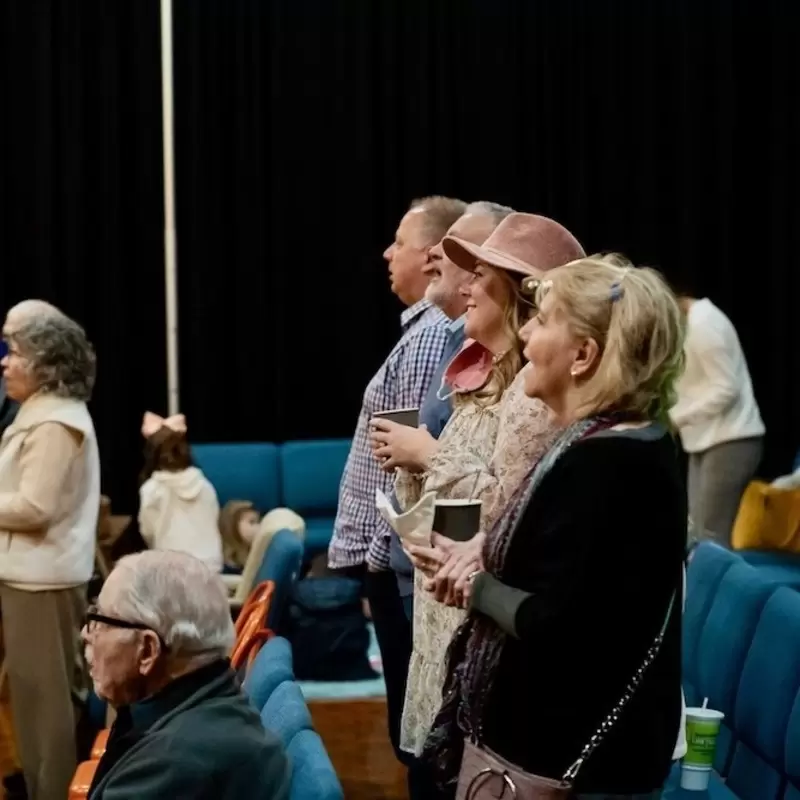 Singing as a group during service.