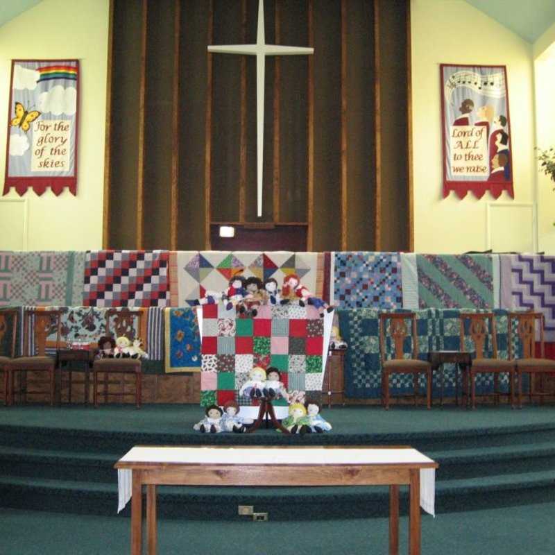 Quilts and dolls by the FBC Sewing Group