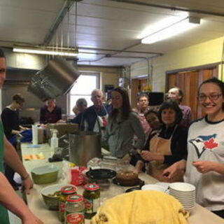 Serving a meal at The Inn of the Good Shephard