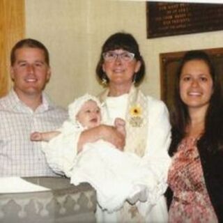 Rev. Laurie at a Mother's Day Baptism 2013