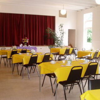 John Stewart Hall set up with tables and chairs