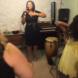 Carla Isaac leading worship