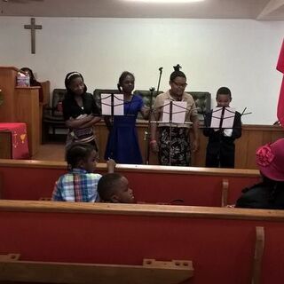 Kids singing on Haitian Flag Day