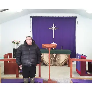 Tony in front of the altar at St. Barnabas Church - photo courtesy of Chris VanBuskirk