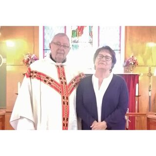 The Rev’d George Critchell and Mrs. Marion Eveleigh, organist at St. Swithin’s Church in Seal Cove since she was 12 years old (62 years ago)