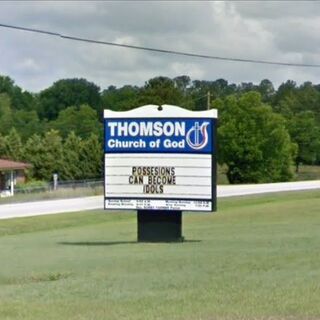 "Posessions can become idols" - Thomson Church of God sign