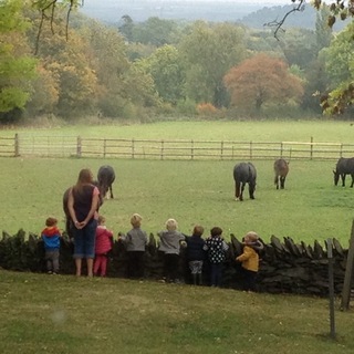 Little Owl Pre-School group admiring the view behind the Baptist church in early autumn