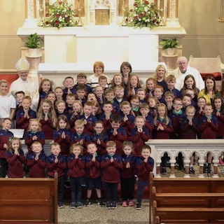 Glenann Primary School children and staff after the 125th Anniversary Mass celebrated by Bishop Alan McGuckian on Friday evening in St. Mary’s Church, Cushendall - photo courtesy of John Healy Photography