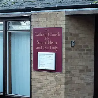 Sacred Heart and Our Lady Church sign