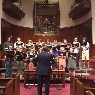 Jerry Cauley leading the Youth Choir in rehearsal