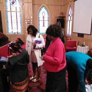 Dr. Doretha Whittington fellowshipping with the other kids after service