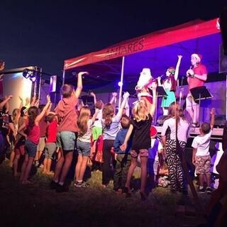 Santa talking to the kids at Rivers Carols