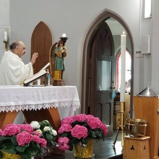 Fr. Vito blessing the new Easter Water for our parish