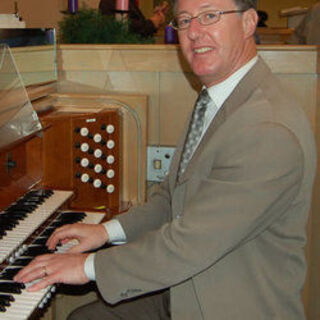 Music Director Paul Sloan at the Console of our current Organ at St Paul's