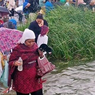 Pilgrims in water