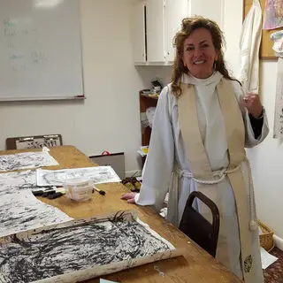 Rev. Ruth Pattison in her pop-up art studio - photo courtesy of John Ruch