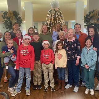 SVDP volunteers and Mini Vinnies visiting The Harbor of Opelika Assisted Living/Memory Care on Christmas 2022