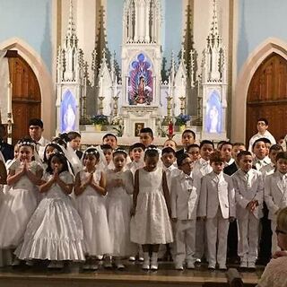 First Communion / La Primera Comunión