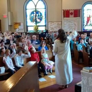 Rev. Kate teaches the congregation