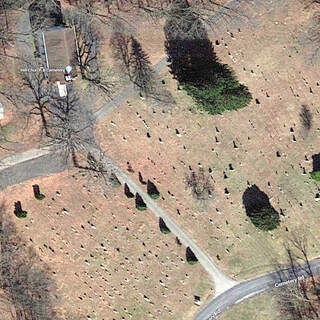 An aerial view of Hill United Methodist Church and cemetery