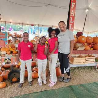 Cutest Family Photo Award at the Alachua's Pumpkin Patch 2023