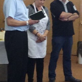 Pastor David wishing Rita and Steve safe travels