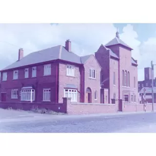 The new church alongside the presbytery