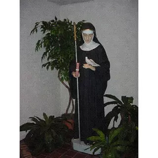 The patroness of our parish St. Scholastica