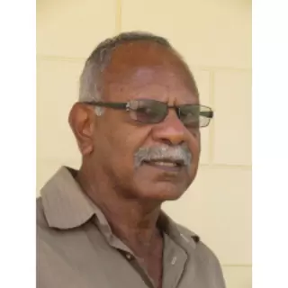 Rev Dennis Corowa