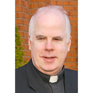 Pastor Fr. Michael Hughes