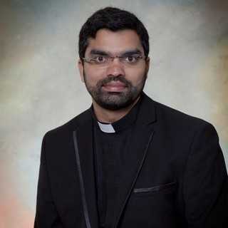 Administrator Rev. Binoy V. Thomas, C.S.T.